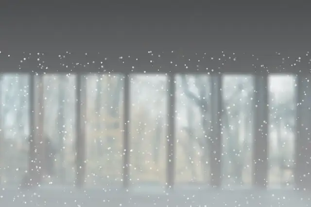 Simulated fogged window glass with a blurred view of trees